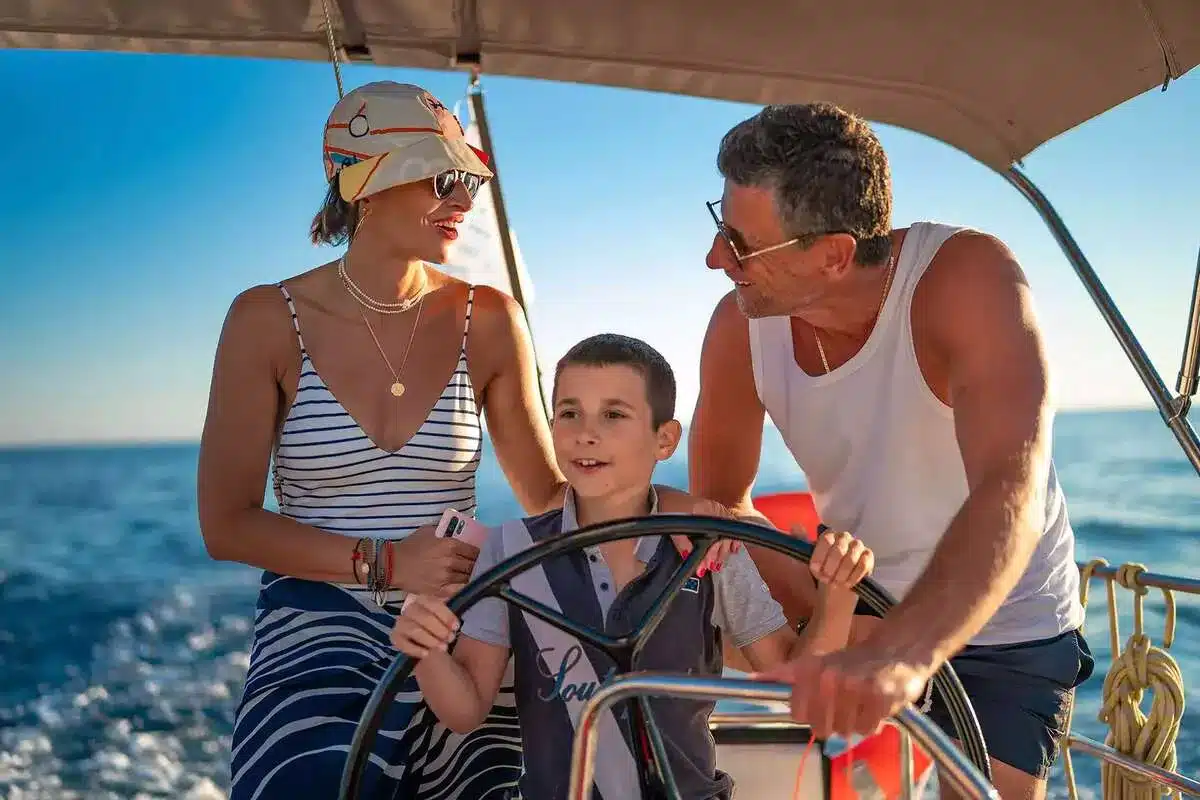 Happy family on a sailboat in Croatia