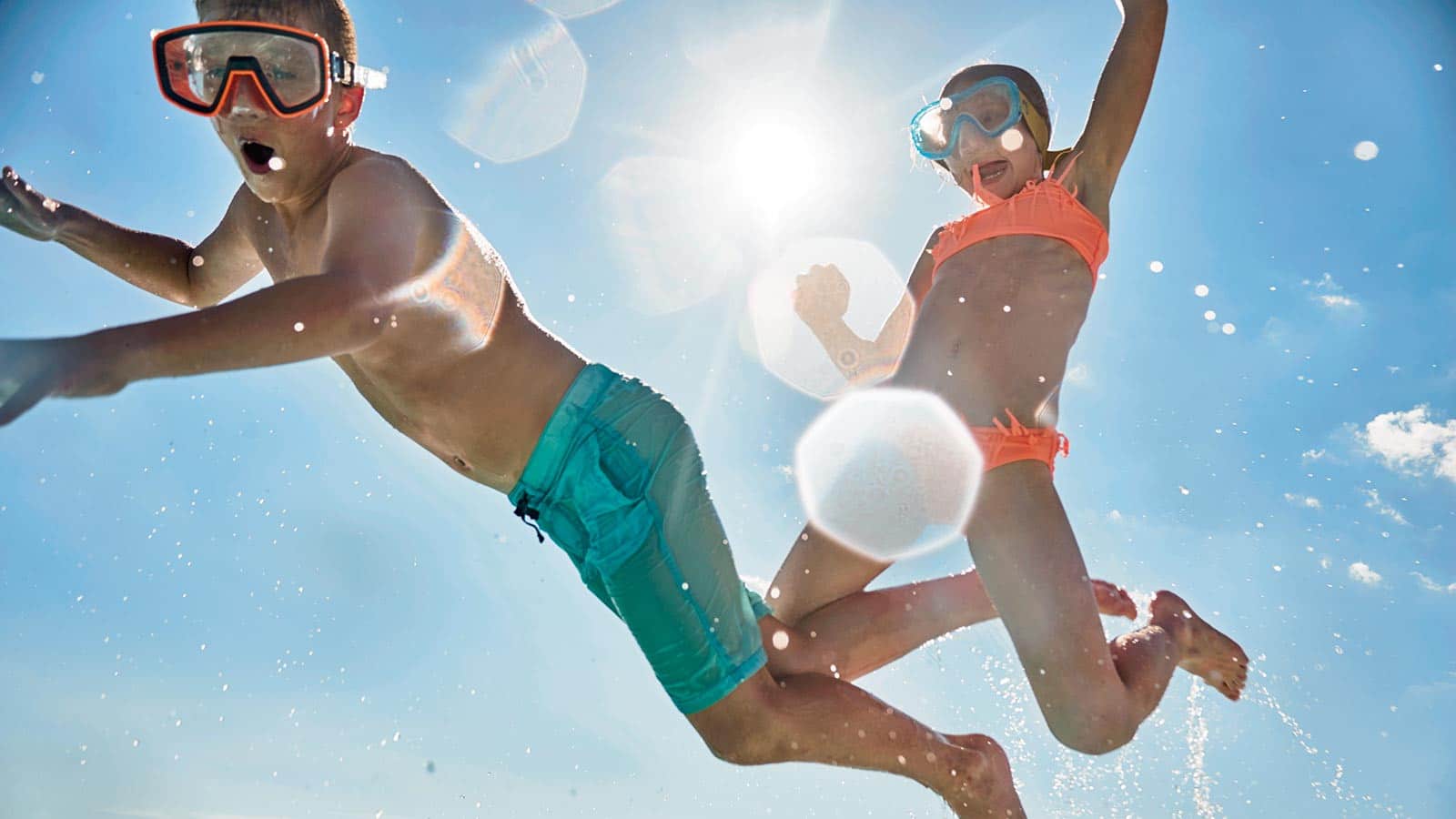 clildren jumping from catamaran in Croatia
