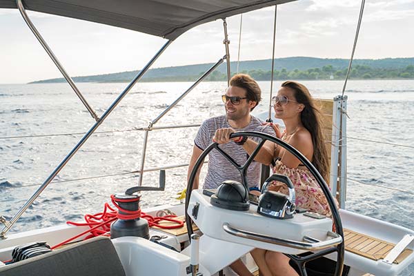 couple sailing on a sailboat in Croatia